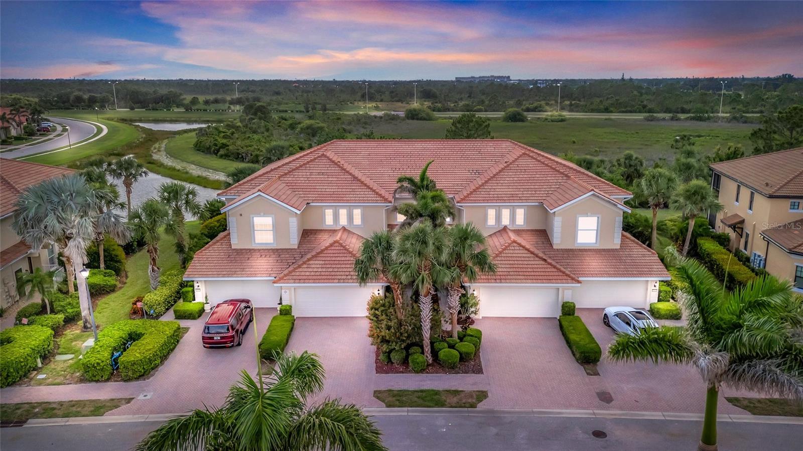 **** Elegant Living Awaits in Sarasota National **** TURNKEY PACKAGE AVAILABLE ****
Step into one of the largest and most exquisitely designed condominium residences in distingished Sarasota National—crafted by Pulte Homes and curated for the discerning buyer seeking luxury, style, and tranquility.
Offering 2,646 SQUARE FEET of refined living space, this stunning home impresses with SOARING 12–20-FOOT CEILINGS, creating a grand and airy ambiance. Throughout the residence, WOOD-LOOK PORCELAIN PLANK TILE FLOORS add warmth and timeless sophistication.
A TURNKEY PACKAGE is available for effortless move-in. Enjoy the convenience of an HOA BUNDLE that includes WATER, EXTERIOR INSURANCE, and BASIC CABLE—plus the opportunity to enhance the home further with well-priced upgrade options.
At the heart of the home lies a fully-customized GOURMET CHEF’S KITCHEN, featuring an oversized center island, premium LG appliances, QUARTZ COUNTERTOPS, and CUSTOM WOOD CABINETRY with smart pull-out storage. Start your day in the charming CAFÉ NOOK, where morning light filters through lanai doors and serene views of the Audubon International Certified Signature Sanctuary await.
The formal dining room, enhanced by WAINSCOTING, sets the stage for unforgettable gatherings. The expansive family room, crowned by a 16-FOOT CEILING and oversized sliding doors, flows effortlessly onto a DOUBLE LANAI with brand-new hurricane-rated screens—perfect for al fresco dining while admiring preserve and water views.
Retreat to the lavish PRIMARY SUITE, a sanctuary with DUAL VANITIES, a built-in soaking tub, an oversized WALK-IN FRAMELESS SHOWER, a discrete water closet, and a 20' × 12' DIVIDED WALK-IN CLOSET.
The residence also includes 2 BEDROOMS, 2 BATHS, a FLEXIBLE DEN/OFFICE SPACE (or possible 3rd bedroom), and a SPACIOUS 2-CAR GARAGE.
Sarasota National’s world-class amenities include:
• CHAMPIONSHIP 18-HOLE GOLF COURSE with pro shop
• ZERO-ENTRY RESORT-STYLE POOL with lap lanes, hot tub, and Tiki Bar serving food, cocktails, and live entertainment
• 7,000?SQ.?FT. FITNESS CENTER with state-of-the-art equipment, group classes, and massage therapy
• PICKLEBALL, TENNIS, BOCCE, walking & biking trails, playground, and full-time activity director
• On-site RESTAURANT hosting curated dining events
Ask about your special lender program to see all your options.
Beyond the gates, enjoy vibrant DOWNTOWN WELLEN PARK just 3 miles away, with COOLTODAY PARK (Braves spring-training venue), kayaking, boutique dining, and food trucks. Plus, the Gulf Coast’s premier beaches are minutes away—MANASOTA KEY BEACH (7.5 MILES) and VENICE BEACH (9.5 MILES).
If you’ve been seeking an elegant residence with upscale features, gracious space, and unrivaled location—this luxurious condo exceeds every expectation. Book your PRIVATE SHOWING today!!!!! Ask about walk through video.