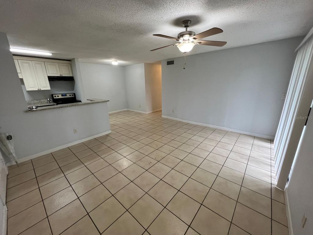 Photo of 2740 Oak Park Way #102, Orlando, FL 32822 (MLS # O6382687)