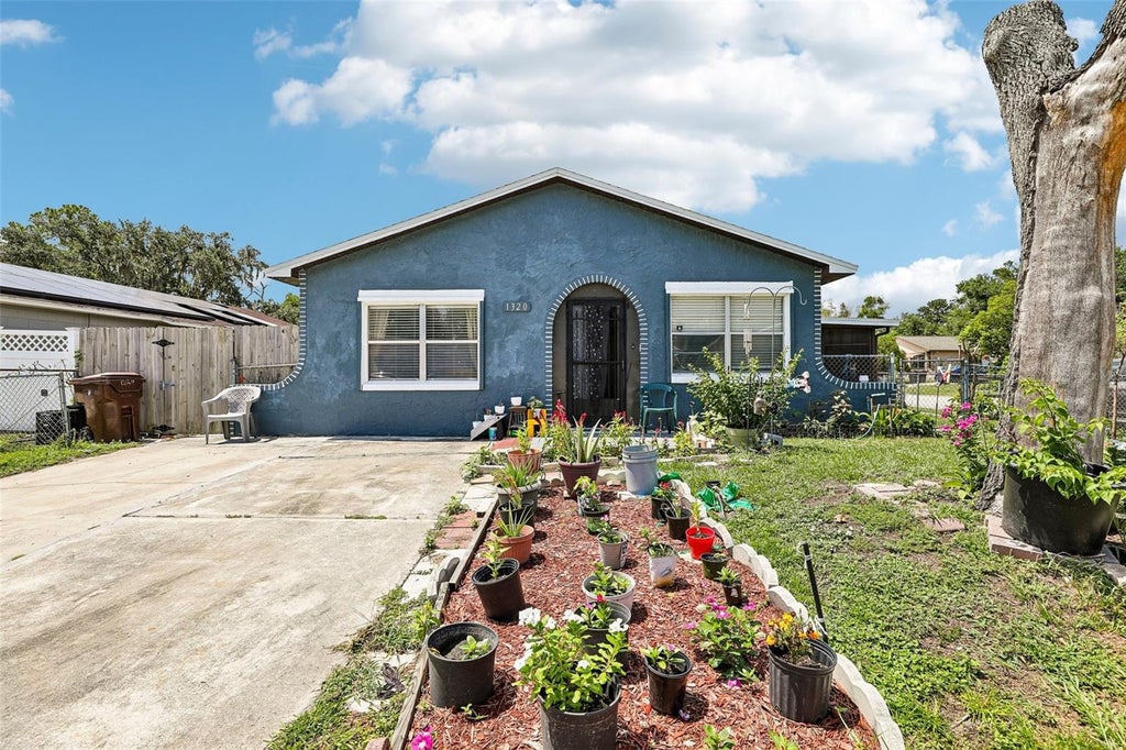 Photo of 1320 Mill Creek Place, Kissimmee, FL 34744 (MLS # O6419178)