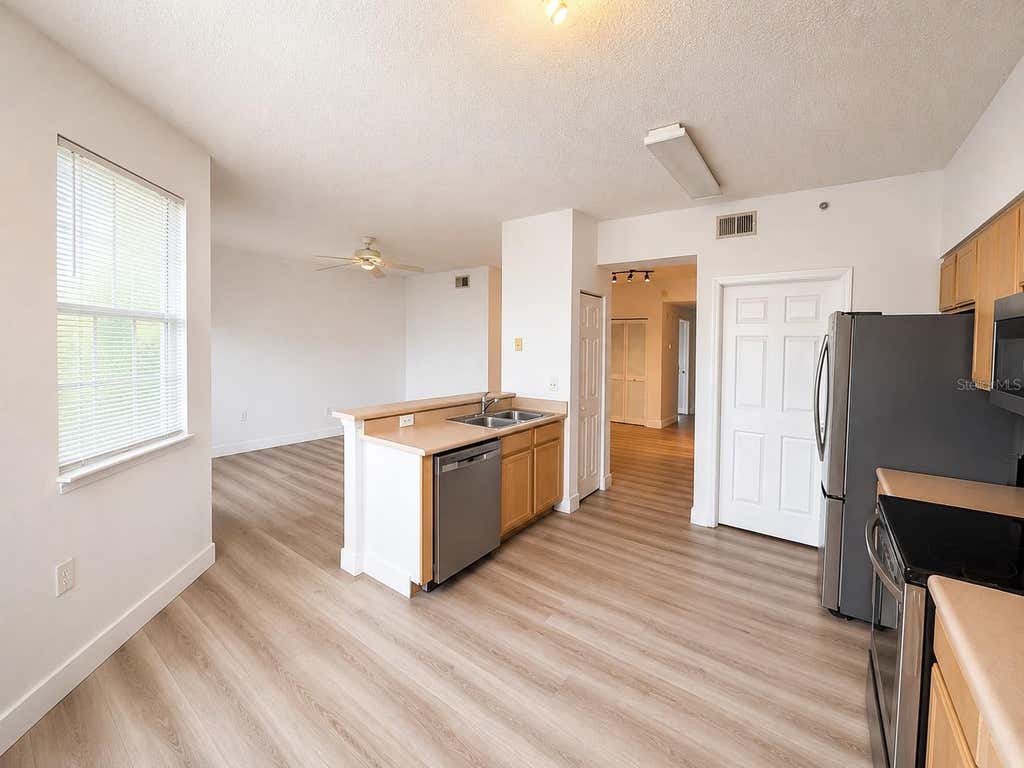 Photo of 10873 Windsor Walk Drive #304, Orlando, FL 32837 (MLS # S5156129)