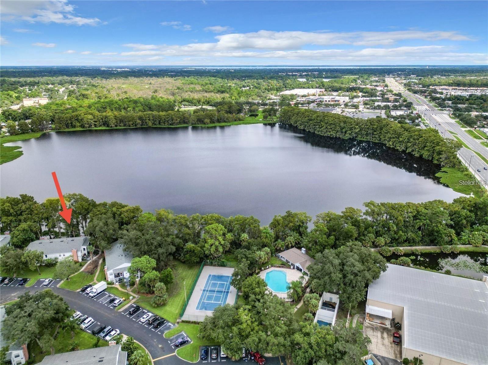 Beautifully updated 2-bed, 2-bath second-floor condo in Northlake Village with scenic Lake Minnie views. Features newer flooring, granite countertops, stainless-steel appliances, and wood-burning fireplace. Community offers lake dock, fishing pier, tennis/racquetball courts, clubhouse, fitness center, and pool. Assigned parking. Close to airport, highways, shopping, Seminole State College, and top Lake Mary schools. Rent includes water, trash, and all shared amenities.