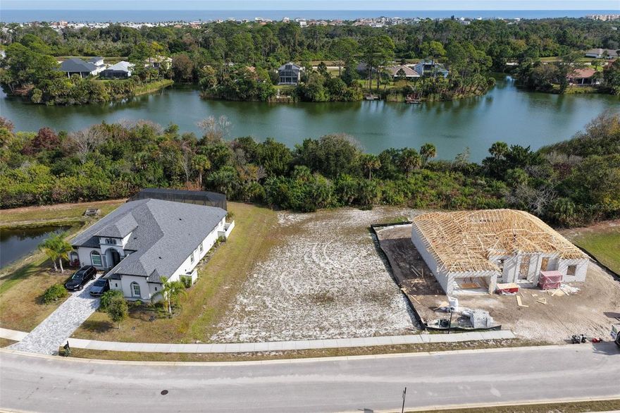 Discover the ideal setting for your future dream home on this stunning lakefront lot located in the highly sought-after, gated community of Palm Coast Plantation. Situated along the pristine waters of Emerald Lake—a 120-acre, spring-fed freshwater lake—this property offers exceptional views, serenity, and endless possibilities for custom construction.
With a generously sized buildable footprint, the homesite can accommodate a home approximately 60 feet wide, giving you ample flexibility for design, layout, and luxury outdoor living. Enjoy the opportunity to add your own private dock, perfect for fishing, kayaking, or simply taking in the peaceful beauty of the lake. Resort style community amenities including a lakefront pool, fitness center, nature trails, pickleball, tennis, basketball courts, and playground area. Private boat & RV storage—unique to this community; boat launch to the ICW adjacent to the neighborhood. Intracoastal pavilion for fishing, wildlife viewing, or enjoying waterfront sunsets. NO CDD and minutes to beaches, golf, shopping, dining, and Flagler’s coastal lifestyle, this is truly one of the best opportunities to build in a premier Intracoastal community. Build your dream home and enjoy luxury living surrounded by nature’s finest.