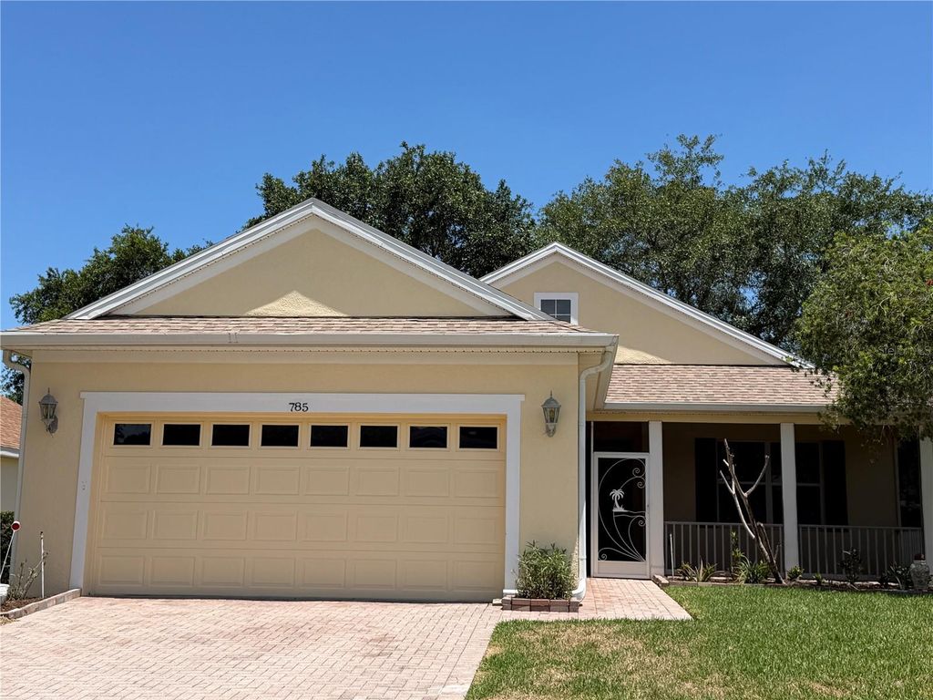 Photo of 785 Summit Greens Boulevard, Clermont, FL 34711 (MLS # O6407598)