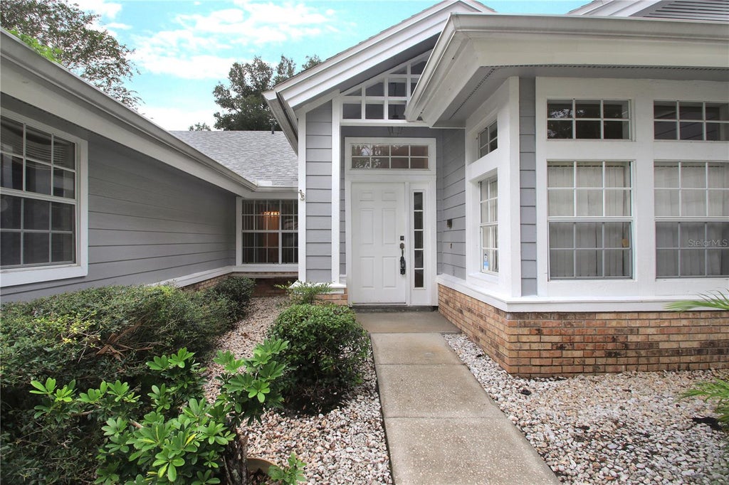 Photo of 3924 Lake Mirage Boulevard, Orlando, FL 32817 (MLS # O6448966)