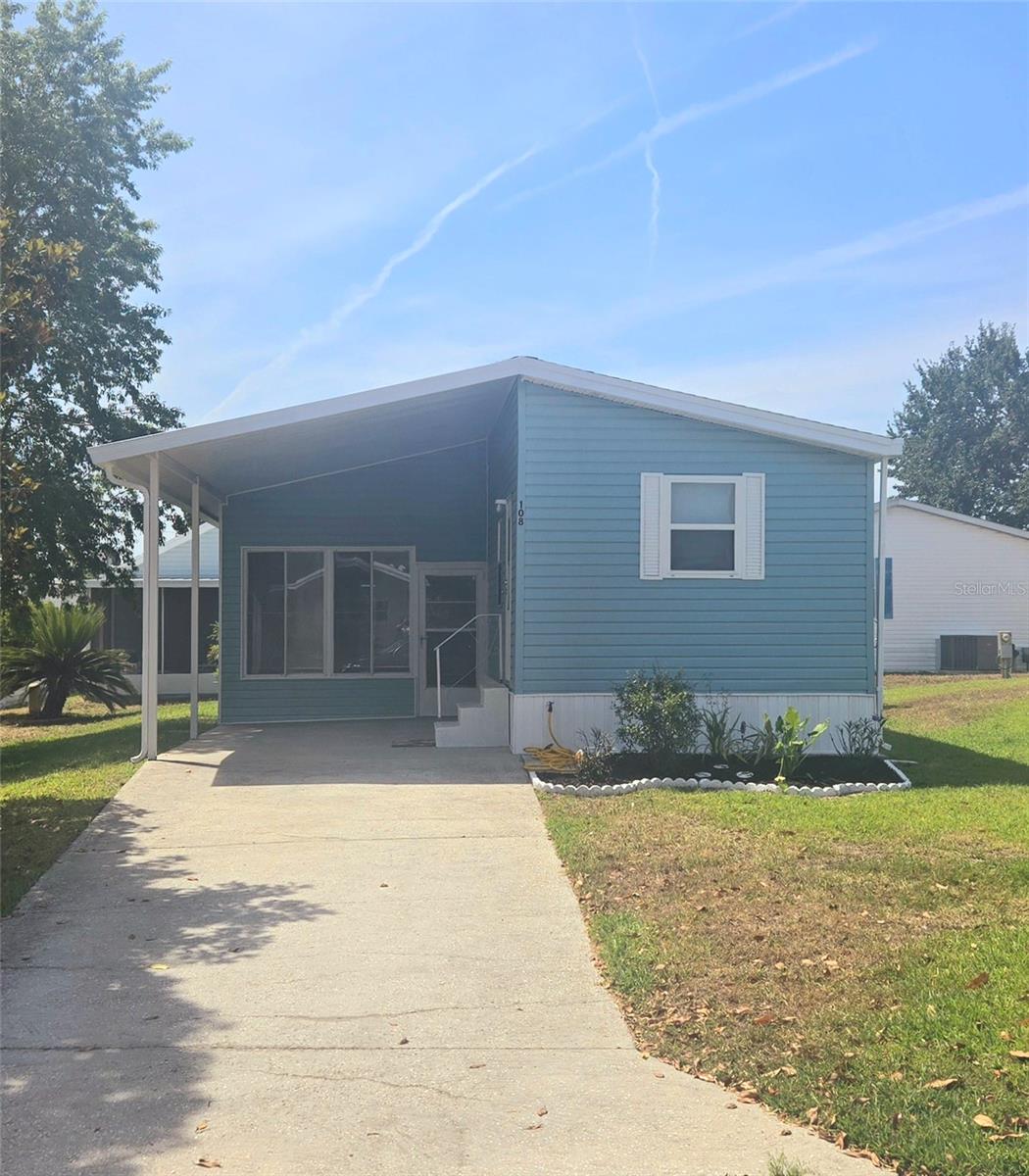 Now is your chance to own this Beautiful, affordable, Low-maintenance home in the Lakefront community of International Bass Lake. . . All ages Community. . . This is a 2-bedroom, 1-bathroom. . . This home features a BONUS ROOM, ideal for remote work or an extra bedroom. . . A split plan and family room/kitchen combo. . . Ready to move in. . Oversized concrete driveway. . . YOU OWN THE LAND . .This home offers both comfort and style, making it the perfect retreat for those looking to enjoy peaceful living with modern amenities. Completely remodeled. New plumbing. New shower. New toilet. Fresh paint. New Flooring. All appliances included And washer and dryer. . . Bass Lake Resort is a highly desirable an diverse community with multiple styles of homes. Located in the Four Corners area on Old Lake Davenport, it is convenient to local theme parks, restaurants, shopping, hospitals and golf, with easy access to Hwy 27, Hwy 192 and Interstate-I 4. Bass Lake features gated access, two pools (one solar heated), hot tub, private community dock and boat launch. A club house with a Gym, pool tables, horseshoe pits, shuffleboard courts, billiards room, and offers locked private storage for your boat/RV. LOW HOA with water included and lawn care. Perfect for first time home buyers, ‘downsizers’, investment property, and for short term rental use.