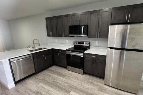 Tiny photo for 985 NW 57th Court #B, Ocala, FL 34482 (MLS # S5149461)