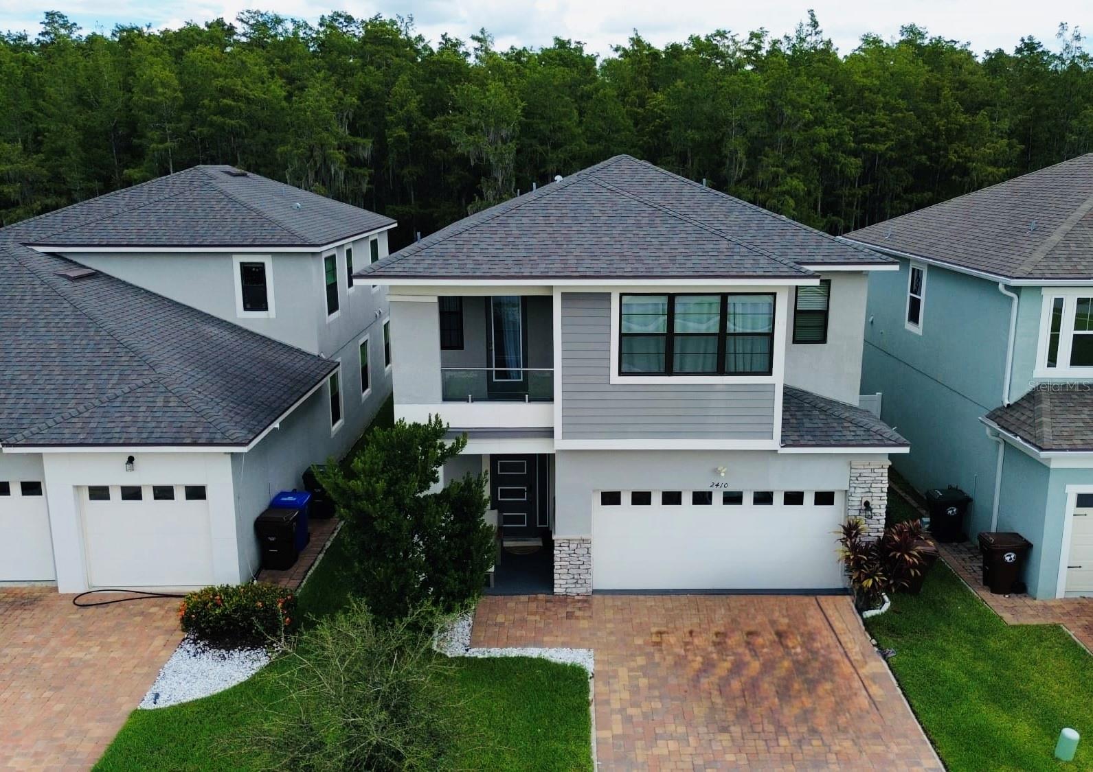Welcome to this stunning 4-bedroom, 3.5-bath single-family home with a private office in the highly desirable Tapestry community of Kissimmee. This spacious residence offers an open-concept layout with abundant natural light, modern finishes, and plenty of room for both relaxation and entertaining. The gourmet kitchen features granite countertops, stainless steel appliances, and a large island, seamlessly connecting to the dining and living areas. The first-floor office provides the perfect space for remote work or study. Upstairs, you’ll find generously sized bedrooms, including a luxurious owner’s suite with a walk-in closet and spa-inspired bathroom. The second level also features a private balcony, perfect for enjoying your morning coffee or evening sunset. Step outside to the covered lanai, ideal for outdoor dining and gatherings, while enjoying the Florida lifestyle. Step outside to enjoy Tapestry’s resort-style amenities, including a clubhouse, fitness center, community pool, and playgrounds. Conveniently located near a top-rated charter school, The Loop Mall, shopping, dining, and major highways, this home combines comfort with an unbeatable location. Don’t miss the opportunity to lease this beautiful home in one of Central Florida’s most sought-after gated communities.