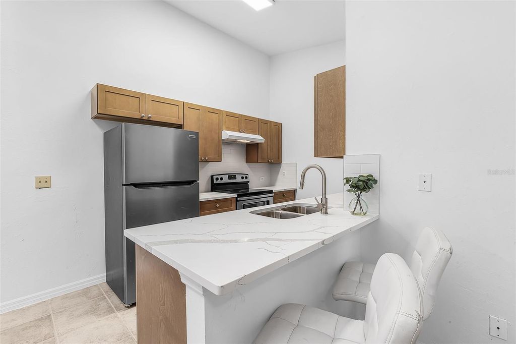 Photo of 1518 SW Courtyards Lane #199, Cape Coral, FL 33914 (MLS # C7520622)