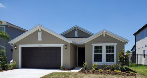 Photo of 30517 Pecan Valley Loop, Wesley Chapel, FL 33543 (MLS # TB8406530)