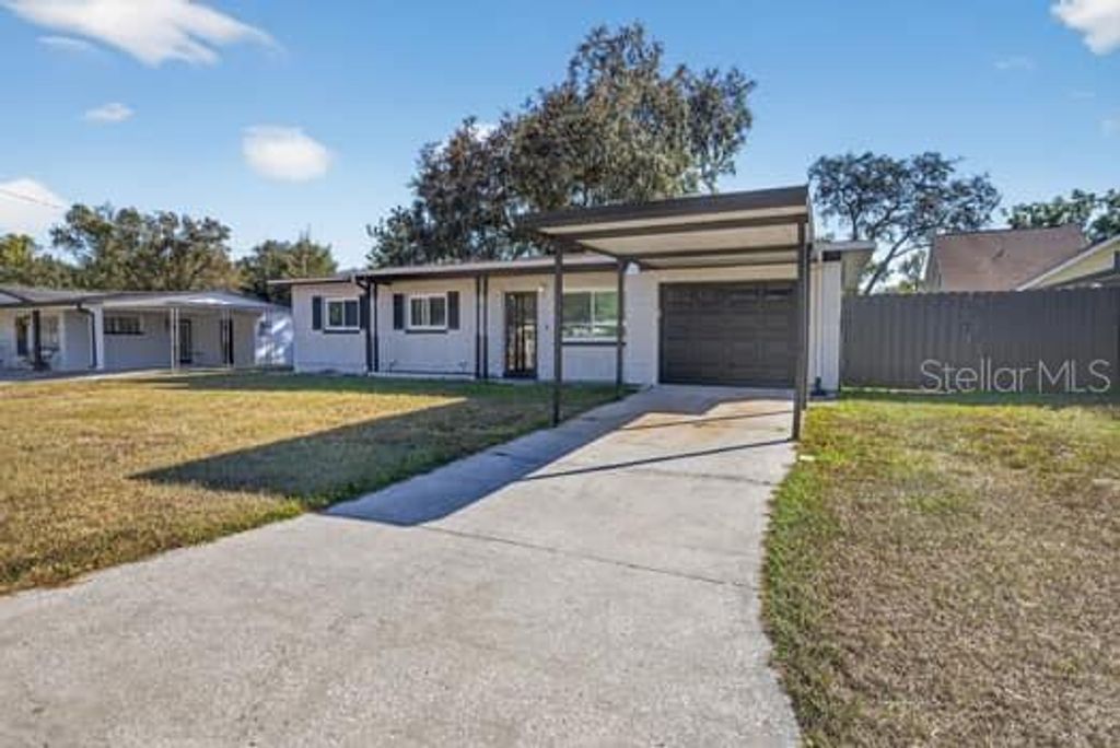 Photo of 806 W 114th Avenue, Tampa, FL 33612 (MLS # TB8428326)