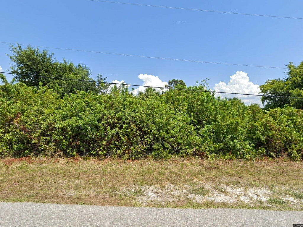 Photo of 9346 Bluegill Circle, Port Charlotte, FL 33981 (MLS # TB8547362)