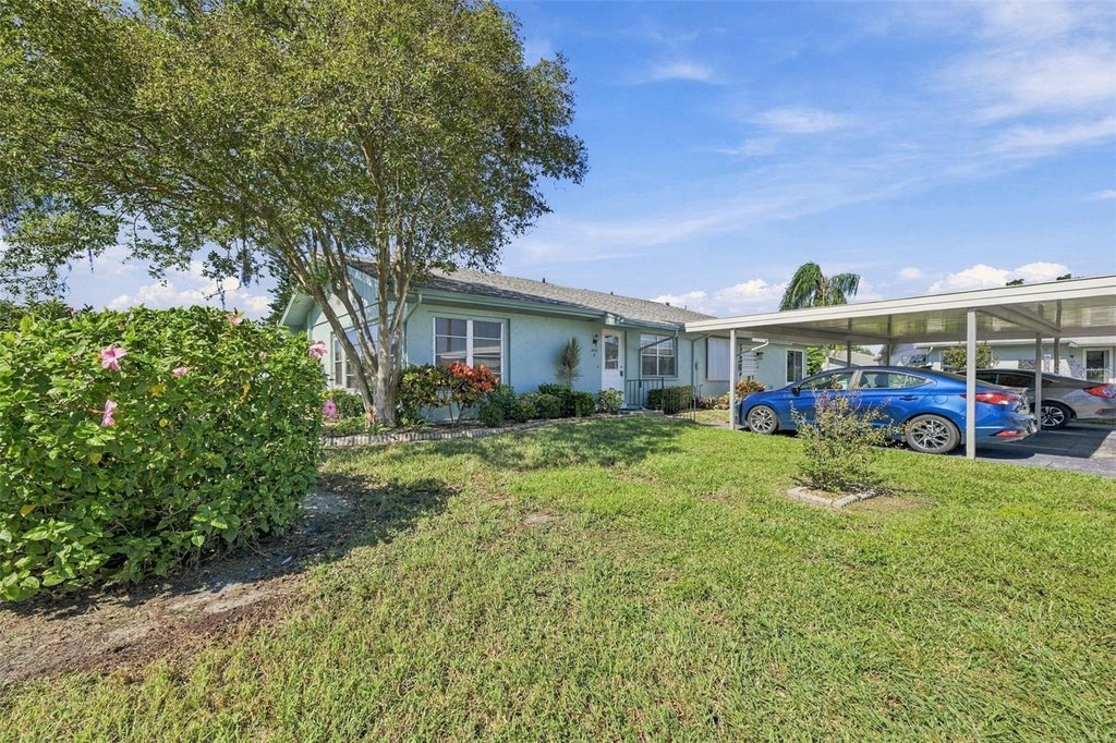 Photo of 404 Flanborough Trail #A, Sun City Center, FL 33573 (MLS # TB8557995)