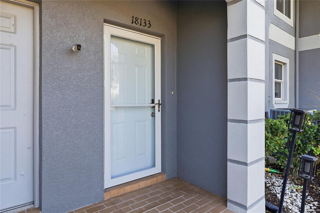 Photo of 18133 Paradise Point Drive, Tampa, FL 33647 (MLS # TB8471923)