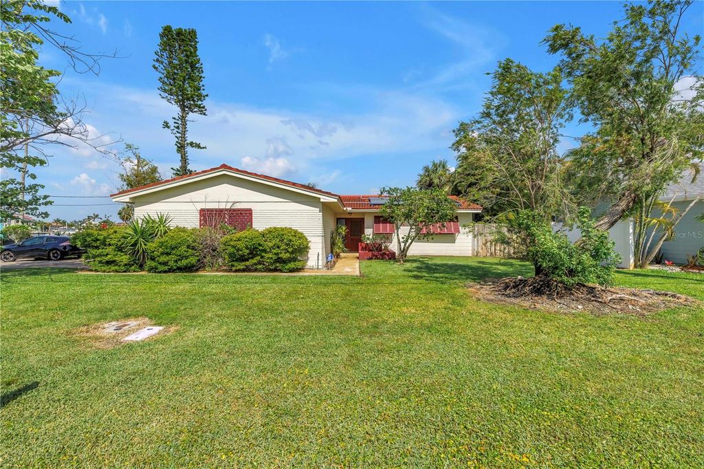 Photo of 557 Crystal Drive, Madeira Beach, FL 33708 (MLS # TB8406247)