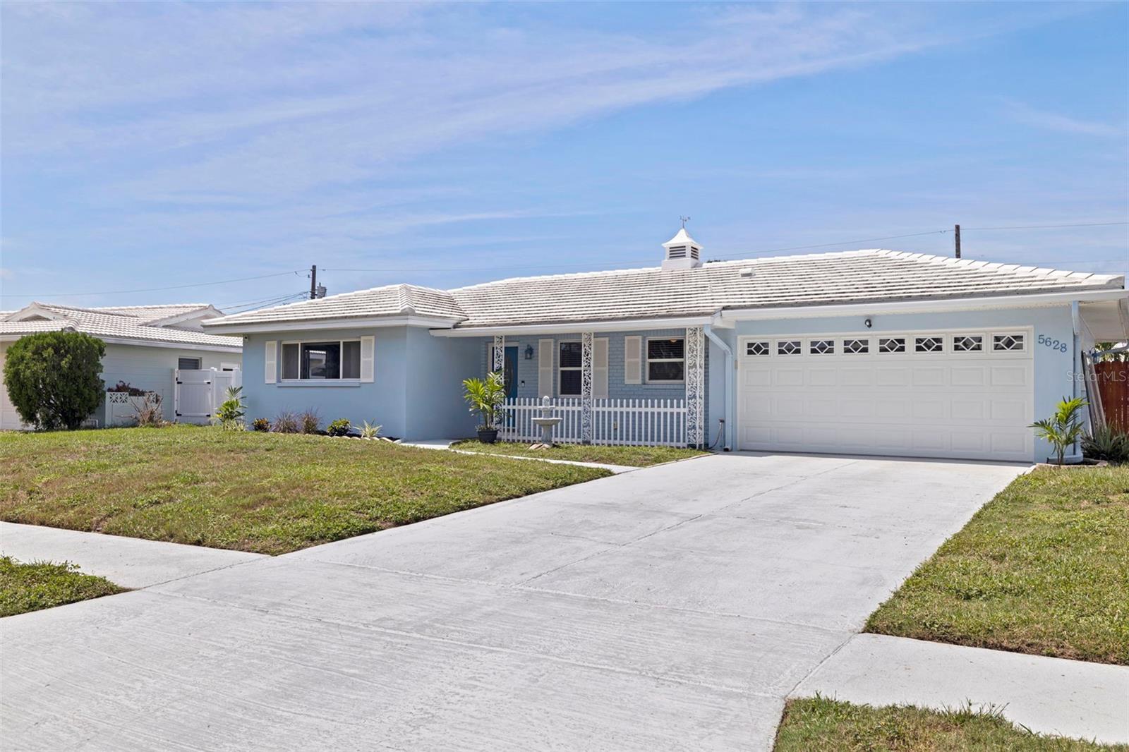 This beautifully RENOVATED SEMINOLE HOME is the perfect blend of style, comfort, and peace of mind with a stunning COASTAL VIBE. Situated on one of the nicest and quietest streets in the neighborhood, it sits HIGH & DRY at more than 30+ feet above sea level, in a non-evacuation zone, and requires no flood insurance. The property is solid block construction and has sustained no damage from recent storms, and offers one of the LARGEST LOTS in the community, making it ideal for a pool or outdoor entertaining. This charming neighborhood features manicured homes, sidewalk streets, and even a community library box. Inside, the home is light, bright, and airy resort-style design. The perfect split-bedroom floor plan provides space and functionality, while tasteful renovations bring a designer touch to every room. The spacious kitchen features marble-style countertops, stainless steel appliances, including a brand-new refrigerator. The main bathroom has been fully renovated, showcasing a gorgeous penny tile shower for a modern look. Both bathrooms have been renovated with Kohler sinks and toilets. BRAND NEW flooring, NEW 5 ¼” baseboard, NEW interior paint, NEW fans, NEW updated electrical and double-pane windows complete this home to make it truly MOVE-IN-READY. Large family room overlooking the EXPANSIVE BACKYARD that has a privacy PVC fence. The two-car garage with an automatic opener adds convenience. The home is also pre-wired for a swim spa or Jacuzzi with a 240V/50 amp outlet. Whether used as a primary residence, vacation home, or investment property, this home offers incredible value with three bedrooms, two bathrooms, and a spacious layout. The location is unbeatable, just minutes from Madeira Beach, Seminole City Center, Fresh Market, shopping, dining, and year-round festivals. Top-rated Madeira Beach Fundamental Elementary and Middle School is nearby, as well as the award-winning Keswick Christian private school. Designed with a Florida lifestyle in mind, this home offers a perfect combination of style, convenience, and security in a sought-after coastal community.