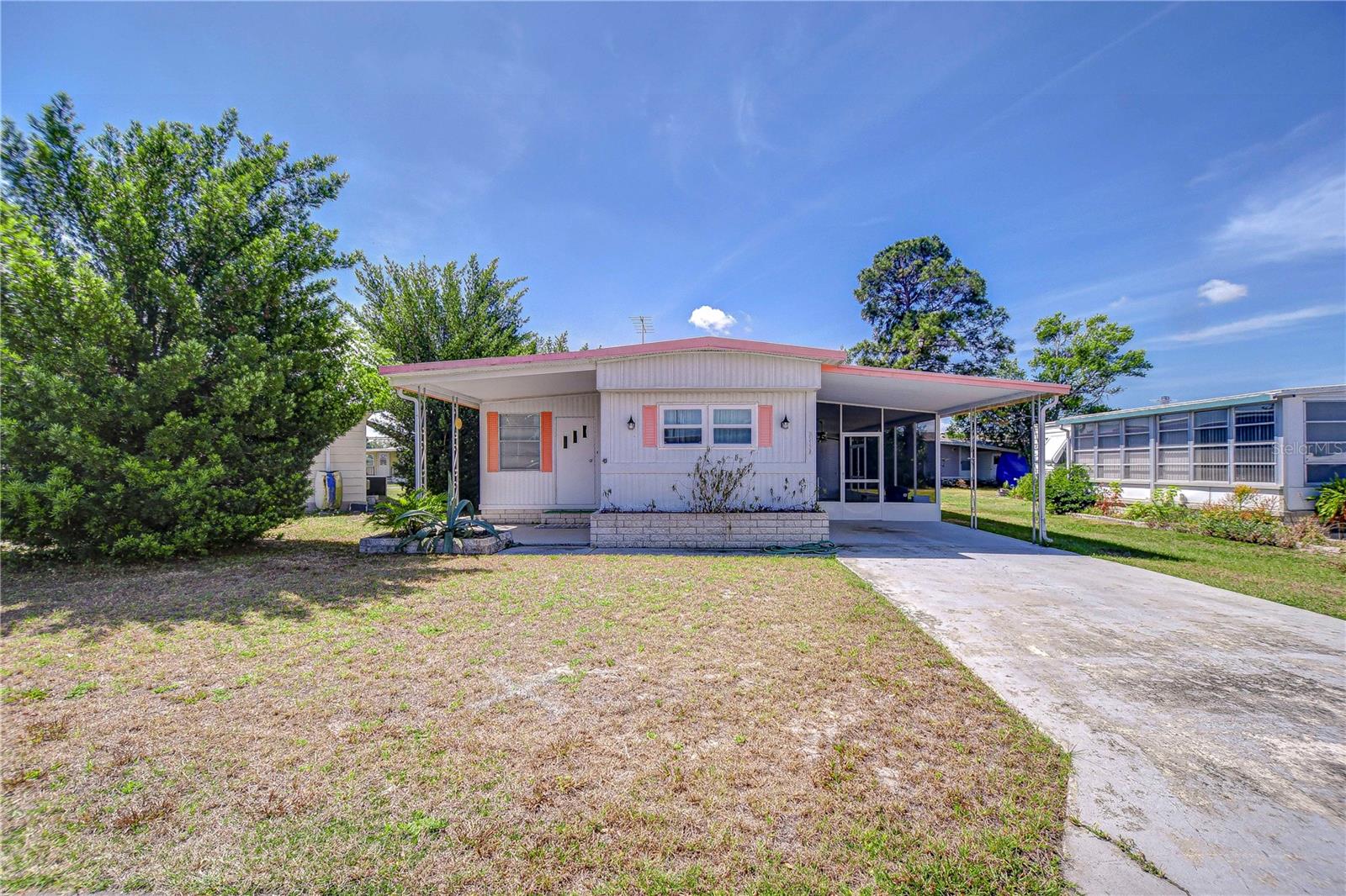 Welcome to Zephyr Shores, a sought-after 55+ community where you own the land—no lot rent here! This charming 2-bedroom,
2-bath single-wide mobile home offers added flexibility thanks to a finished addition, perfect for use as a THIRD bedroom, dining
area, TV room, or private guest suite. The addition includes a full bathroom with a spacious shower and a sliding door for privacy.
Offered furnished, this move-in-ready home is just waiting for your personal touches. On the outside you have a screen room
measuring 12’ x 31’ approximately with a utility room at the end—complete with a washer, dryer, and storage space. Just outside the
addition, relax on your cozy covered patio on the peaceful east side of the home. AC unit replaced March 2023. Also new washer,
dryer & refrigerator February 2023. Zephyr Shores is ideally located for convenient access to shopping, dining, medical facilities,
parks, and all that Tampa has. The low HOA fee includes twice-weekly trash pickup and access to a clubhouse,
swimming pool, shuffleboard courts, and scenic Six Mile Pond. Come see for yourself why Zephyr Shores is such a popular place to
call home!