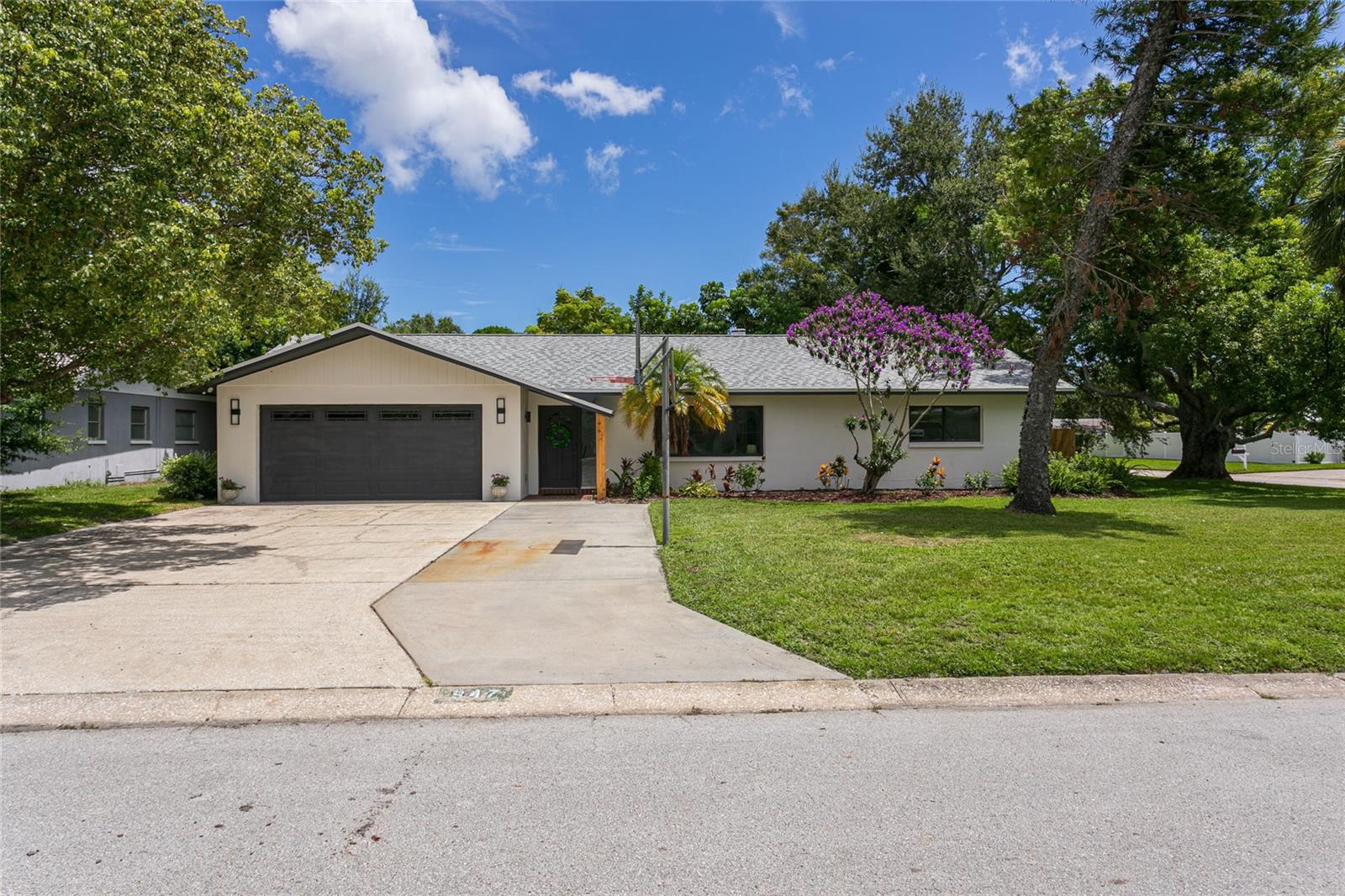 ***Luxury Living/ New Roof 2024/ Fully Renovated Home**** Impeccably updated 3- bedroom, 2- bath home with a 2-car garage on a highly desirable corner lot. Recent upgrades include a new roof (2024) , water heater (2025) fence (2025), modern windows (2014), HVAC (2015). The Fully renovated kitchen (2025) boasts quartz countertops, new soft closed cabinets, and stainless steel appliances. The spa-inspired bathrooms (2025) , luxury vinyl flooring, (2025) and a renovated epoxy finished garage (2025) add modern elegance throughout. Freshly painted from inside and out, with a spacious fenced backyard, this home is move-in ready, outside a flood zone and no history of flooding, and perfect for both sophisticated entertaining and everyday living.