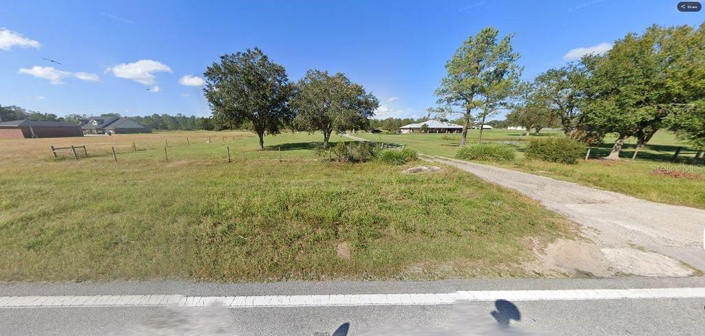 Photo of Old Grade Rd, Polk City, FL 33868 (MLS # O6266209)