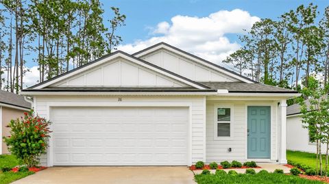 Photo of 26 Flagstick Lane, Bunnell, FL 32110 (MLS # FC315082)
