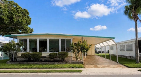 Photo of 1100 Belcher Road S #304, Largo, FL 33771 (MLS # TB8543802)