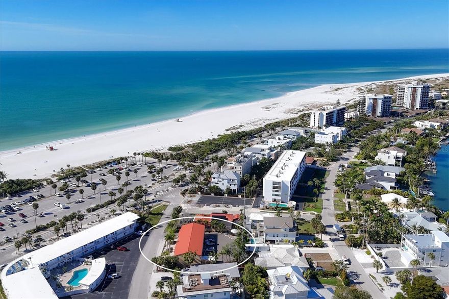 Located just across the street from the sugar-white sands of Lido Key Beach and the Lido Beach pool and pavilion, this updated one-bedroom, one-bath condominium offers the ideal blend of coastal convenience and low-maintenance living. Situated near the shops and restaurants of St. Armands Circle and only minutes to downtown Sarasota, this residence places you in the heart of one of the area’s most desirable island communities. The interior has been tastefully renovated and features wood-look plank tile flooring throughout, creating a clean, modern coastal aesthetic. The kitchen showcases white cabinetry, stainless steel appliances, and quartz countertops, providing both style and functionality. The open layout is filled with natural light and serves as a comfortable retreat after a day spent at the beach. This property is perfect for a local buyer seeking an easy beachside getaway, a seasonal residence, or a rental investment in a consistently high-demand location. Enjoy spontaneous beach days, sunset walks along the Gulf, and effortless access to dining, shopping, and cultural attractions. Take advantage of this rare opportunity to own a slice of paradise.