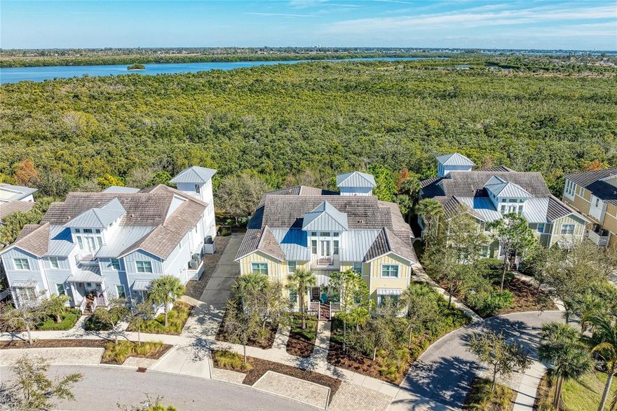 Welcome home to this easy, breezy, Margaritaville-inspired coastal living home! This luxury
home is strong and built-to-last and is the largest home available in all of the gated, coastal
resort community of Harbour Isle on Anna Maria Sound. This Harbour Grand Retreat model is
2962 sq. ft., is rarely available and move in ready with furniture negotiable. It has 3 full
bedrooms, 3 full baths, formal dining, kitchen with island and nook, sunroom, retreat,
observatory, living room, foyer, large 2 car garage with added loft storage, personal elevator going to 2 floors and 3
outdoor spaces for your enjoyment. The Owners’ suite is private and tranquil and the Owner’s
bath features dual vanities, a walk-in shower and maximum counter space and storage. The
suite also features two walk-in custom closets. One guest bedroom has an en-suite bath,
allowing for maximum privacy for your guests. The home features a third spacious bedroom
and an office/reading/music room. The third full bath is located in the hallway and easily
accessible from the main living area. This home has many upgrades including—stainless steel
appliances, custom window treatments, granite, solid wood cabinets, vaulted ceiling in living
room, engineered wood floors in living areas and Owners’ suite, tile in baths and bedrooms,
tile planking in observatory (so no carpet), vaulted ceiling, French doors, crown molding and
custom wall and ceiling wood work, tray ceiling in bedroom, ceiling fans throughout, shelving in
garage, and much more. The homes’ light and spacious feel are something to truly enjoy. The
location of this home provides for extreme privacy and serenity as you welcome the day with
stunning sunrises over Robinson Preserve and watch all of nature come alive. The award-
winning community of Harbour Isle is second to none! The building has block construction with
Hardie board exterior siding and PGT impact rated windows. This home is beautiful coastal
living at its best. All of Harbour Isle’s fabulous amenities are there for your enjoyment—including
two miles of walking trails with inviting hammocks and benches along the way. The 23,000 sq.
ft. Beach Club, overlooking Anna Maria Sound, is all yours — where you can raise a glass at
the Sky Bar lounge and toast sunsets. Explore the Beach Club area with the heated resort pool,
spa, beach to launch kayaks into the Sound, and the 4,200 sq. ft. fitness center. A calendar of
lifestyle events are provided for you to enjoy. There are four pools for your use in Harbour Isle.
The Mangrove Walk pool area is the closest to this home and features grill area, cabanas,
dining area and fire pit—in the other direction is the pool, splash pad, grills and playground in
One Particular Harbour. Just outside the gates of the community is Safe Harbor Marina,
Floridays Restaurant and Compass Hotel. This gorgeous home is just a little over a mile from
the sugar sand beaches and island charm of Anna Maria Island and less than two miles from
Robinson Preserve with miles of walking, biking and kayaking. Live, relax, enjoy an active
lifestyle in award-winning Harbour Isle. This resort-style, coastal living can be all yours! See it
today and start living your best life!