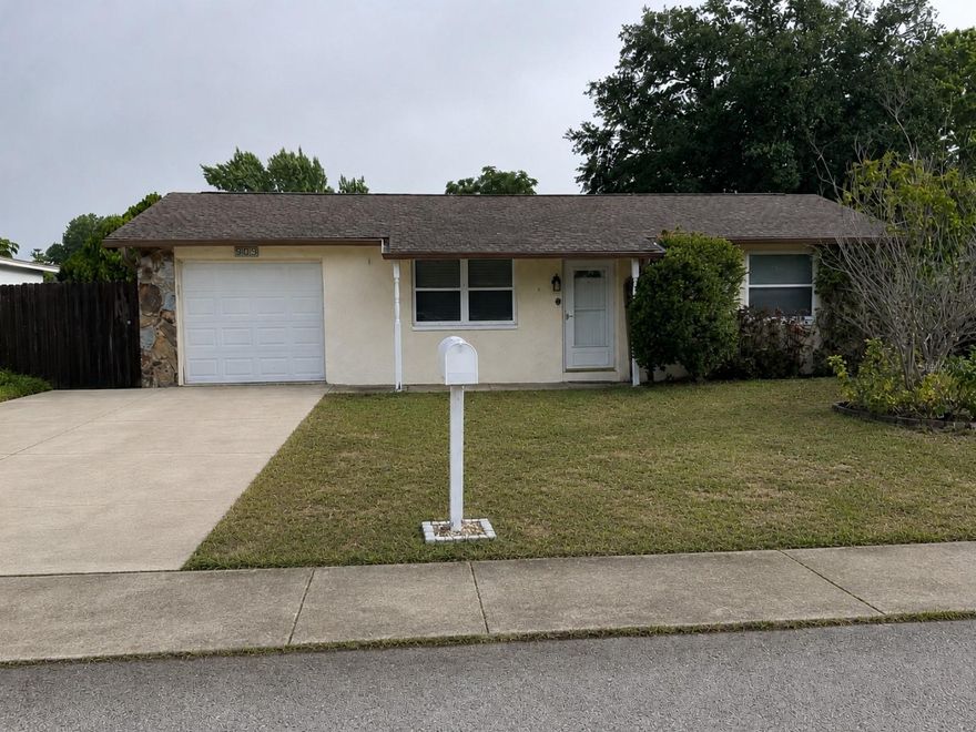 Welcome to this charming two bedroom, one bath home in Embassy Hills, Port Richey. This well maintained property has a hundred twenty five square foot addition wich brings it to two bonus rooms and a one car garage, providing plenty of room to grow. The home boasts a recently updated roof installed in 2023, and enjoys a spacious fenced backyard perfect for family gatherings. Located near Werner Boyce Salt Spring State Park, you'll have easy access to outdoor recreation including kayaking, fishing, and paddleboarding, whilst enjoying proximity to local shopping, dining, and entertainment options. An ideal starter home with excellent bones and potential.