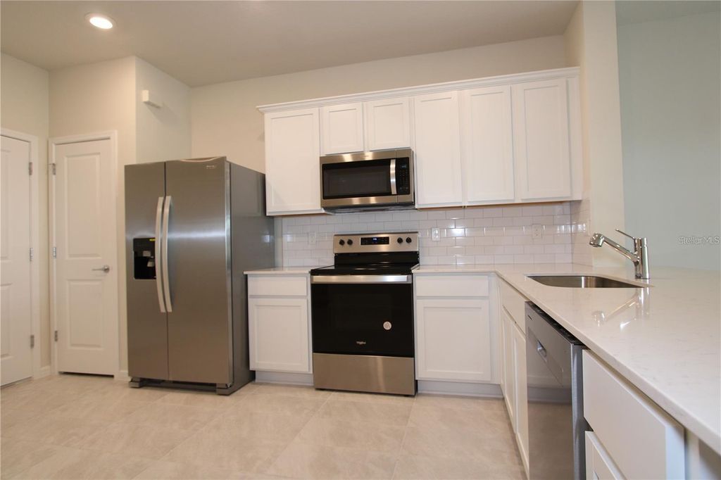 Photo of 2606 Winsome Way, Davenport, FL 33896 (MLS # O6404394)
