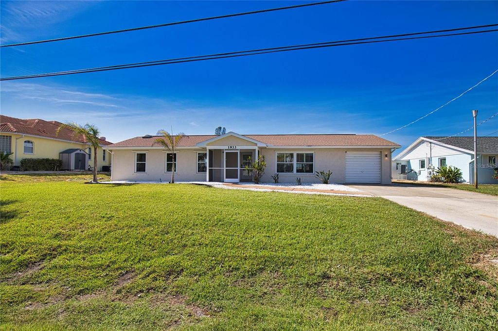 Photo of 1933 Oregon Trail, Englewood, FL 34224 (MLS # O6310888)
