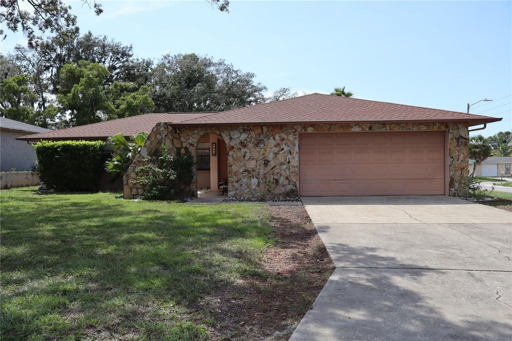 Photo of 8949 Forest Lake Drive, Port Richey, FL 34668 (MLS # W7888643)