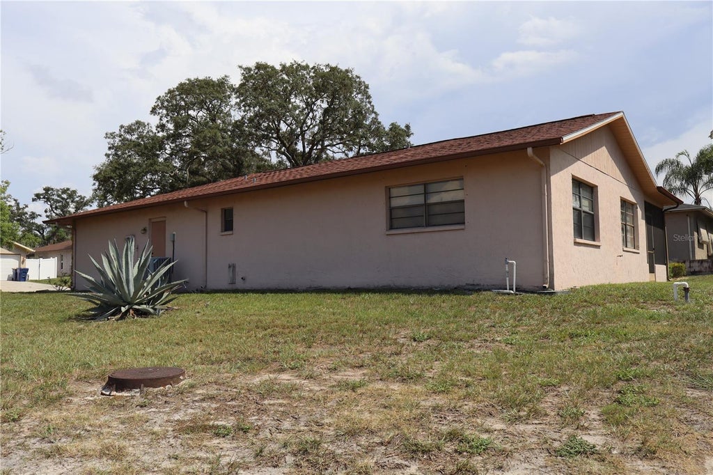 Photo of 8949 Forest Lake Drive, Port Richey, FL 34668 (MLS # W7888643)