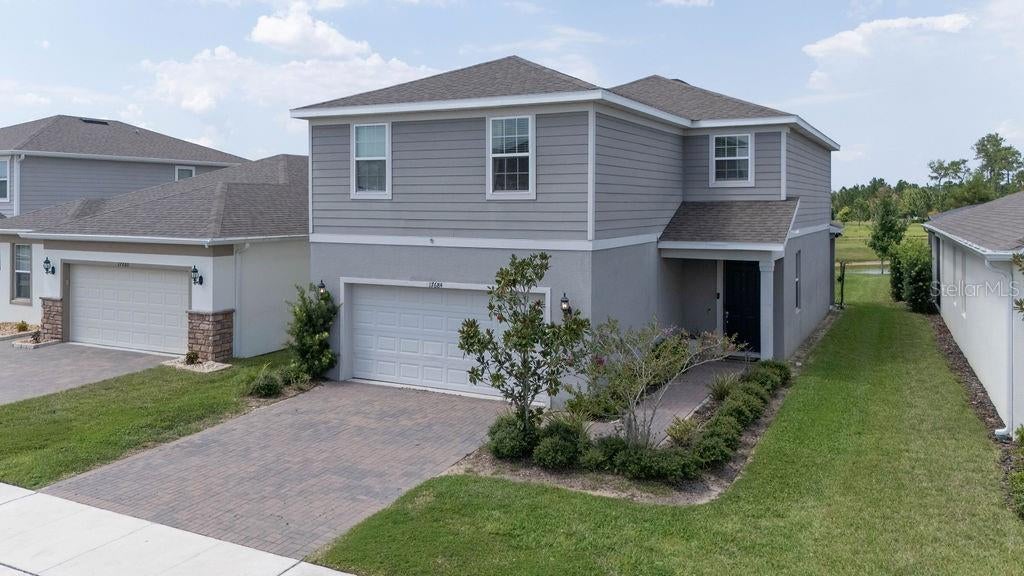 Photo of 17684 Saw Palmetto Avenue, Clermont, FL 34714 (MLS # O6436347)