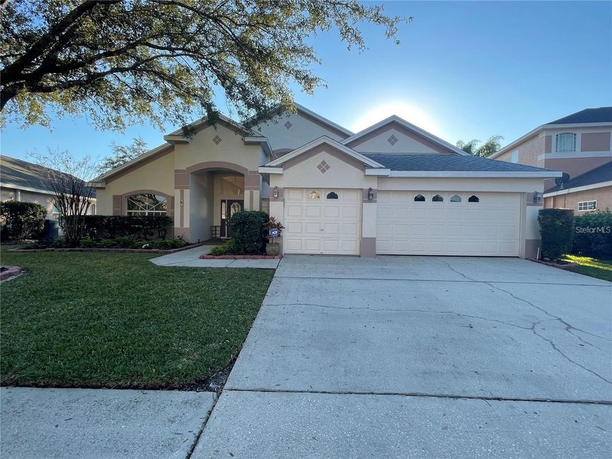 Well maintained 3 bedrooms plus an office, 2 baths, 3 car Garage with an extended lanai overlooking a pristine pond. Spacious open great
room floorplan with a side formal dining room and vaulted ceiling. Kitchen has 42” cabinets with stainless steel appliances and granite
countertops, separate breakfast nook with bay window. Master bedroom offers his and her walk-in closets, bath with 2 vanities, garden tub and walk in shower. Split bedrooms plan with the other 2 bedrooms on one side of the house and has an updated bathroom. 4th room can be used as an office or a bedroom. Family room has a slider that leads to the extended screened in lanai with brick pavers and a side fenced in yard all with a beautiful pond view. Located in the gated community of Arbor Greene that has a resort style amenities including a clubhouse with tennis courts, a fitness center, and an Olympic size pool. Conveniently located near schools, the New Tampa regional library, malls, and Hospitals.