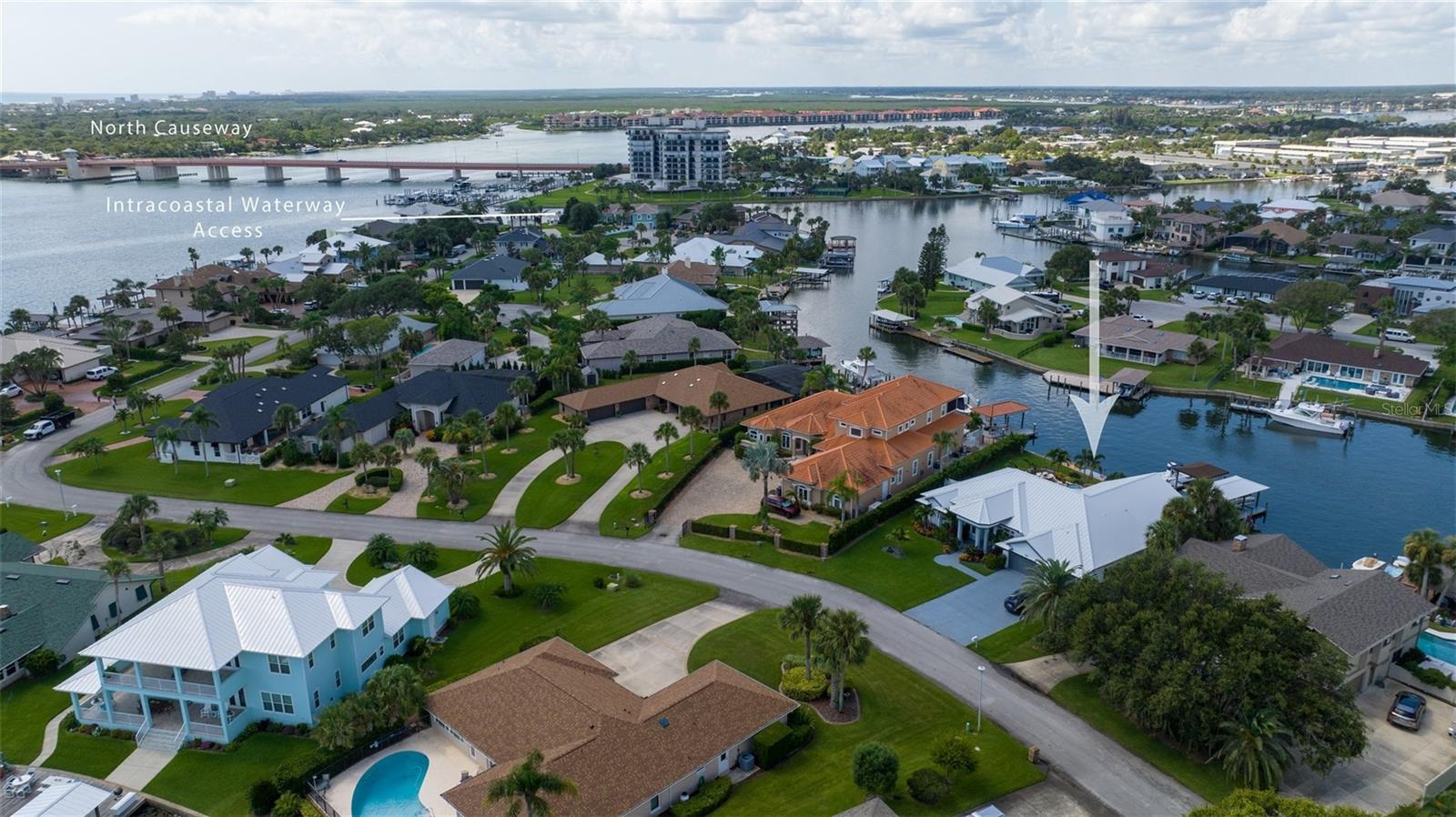 This is a rare opportunity to own a captivating home with 120 frontage feet on DEEP water canal in New Smyrna Beach. Privately situated in the best location in the Venezia Hamlet with 120' of New Docks and Seawall, ready to accommodate your 50'++ Boat and/or Multiple Boats. Situated on a Safe Harbor tucked away from the rushing tides with approximately 6'+ at low tide. Truly, one of the Best Locations to dock your Boat or Yacht! Boasting impeccable Design and superior Craftsmanship, this recently Remodeled and Updated residence offers Elegance and Coastal Charm.
This Newly Renovated 4 bedroom, 3 bath, 3 car Oversized Garage residence has a light and airy layout, featuring a Gourmet Kitchen with Top-of-the-Line Appliances and plenty of space for Entertaining. Special features include Butcher Block Counters, Pot Filler, Plantation Shutters, Natural Gas throughout, Central Vacuum System, Hurricane Shutters, New Metal Roof early 2023, 2 new Hot Water Heaters, Generator ~2 yrs old, 5 Zone Sprinkler System, Dock replaced ~8 months ago, Pool and Decking 1.5 years old.
Walk, Bike or Golf Cart ride to Restaurants, Vet, THE best Coffee Shop, Physicians, Boutique Shopping, Nightlife and of course our White Sand Beaches. Be sure to check out our Video Tour! Don't miss your Chance to own this Dream Home. Call your NSB LOCAL Realtor and Lifestyle Expert today to schedule a Showing and for a list of recent improvements and critical information regarding the property.