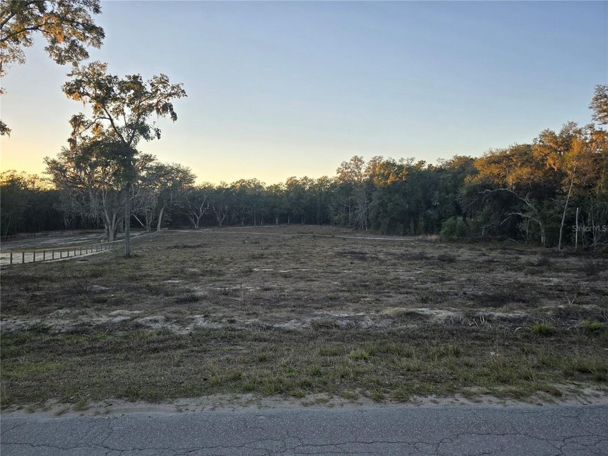 Build your dream home on this quiet 3.41-acre parcel in Rolling Ranch Estates, ideally located near Highway 200 and Hwy 484 and close to charming Dunnellon for easy access to shopping, medical facilities, dining, and entertainment. Dunnellon is known for it's small-town charm and proximity to the beautiful Rainbow River, offering kayaking, tubing, and outdoor recreation. Nearby access to the mountain bike trails on the Florida Greenway, via Ross Prairie or Pruitt trailheads. The property is cleared in the front and thinned in the back, providing a great balance of usability and privacy. For a head start to building your home, a survey has already been completed. Property is within walking distance to the community park which has Kellog Pond and Lake Otting that features a walking trail around the lake, playground for the kids, basketball/racquetball and tennis courts available with no HOA!. Enjoy peaceful country living with convenient access to everyday essentials and Florida's natural beauty.