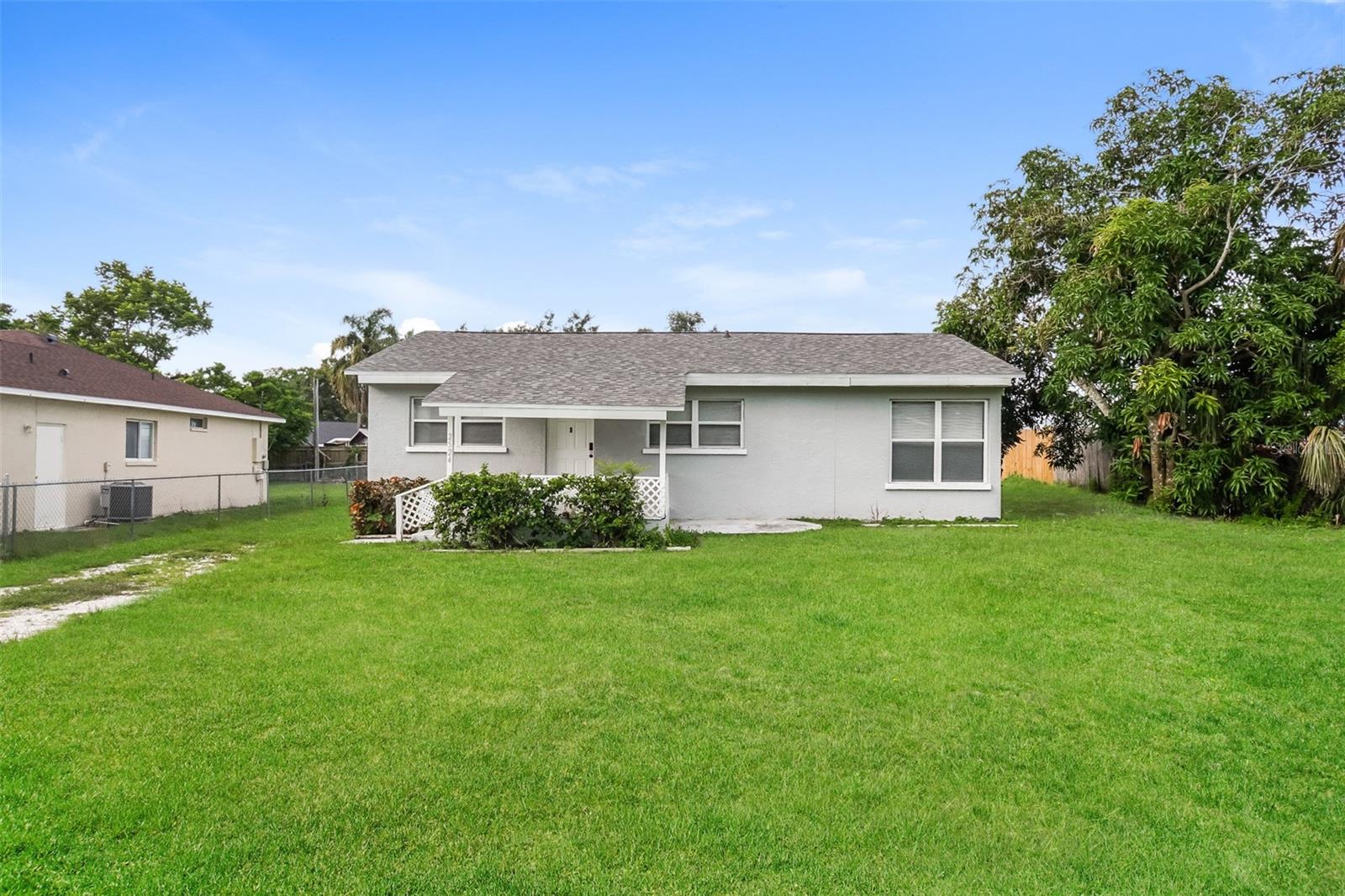 Charm and curb appeal abound for this Bradenton home! Step inside into the well-appointed living room and into the kitchen, which boasts stainless steel appliances, hard surface countertops, and ample storage. This ranch style floorplan offers a primary suite and two secondary bedrooms and is eagerly awaiting its next owner. Come and see for yourself the possibilities that this home has to offer!