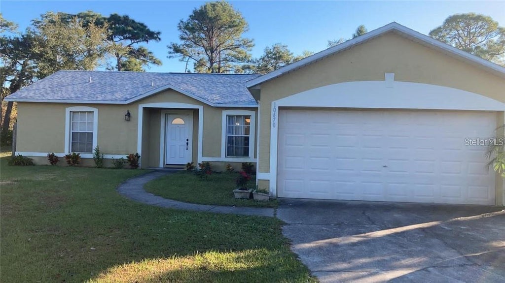 Photo of 10470 Coconut Grove Lane, Orlando, FL 32825 (MLS # S5152523)