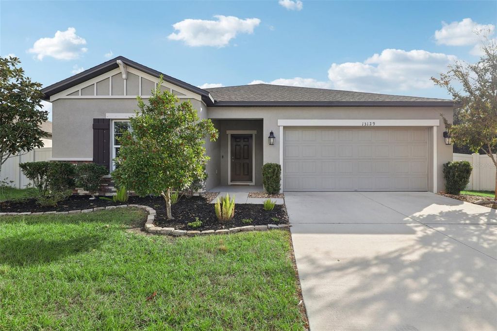 Photo of 13129 Conquistador Loop, Spring Hill, FL 34610 (MLS # TB8448844)