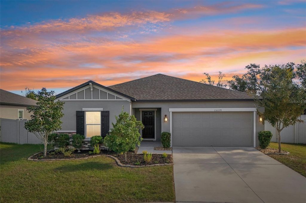 Photo of 13129 Conquistador Loop, Spring Hill, FL 34610 (MLS # TB8448844)