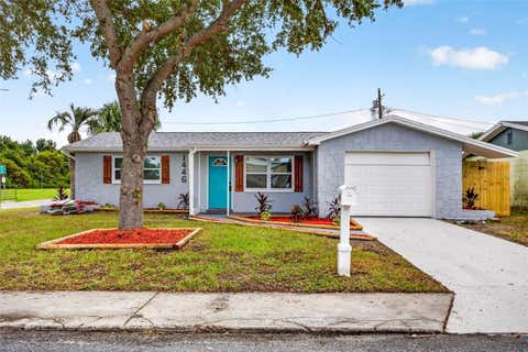 Photo of 1446 Merrilon Drive, Holiday, FL 34691 (MLS # W7888829)
