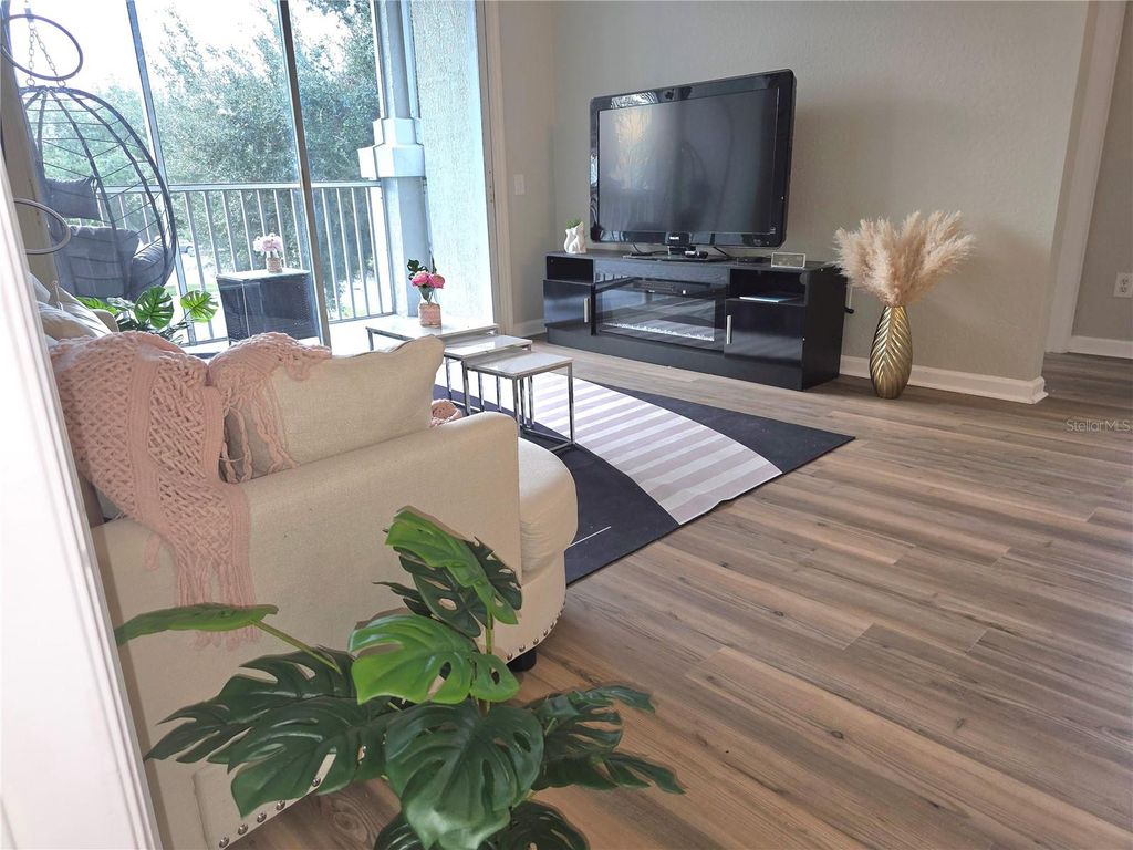 Photo of 2307 Butterfly Palm Way #201, Kissimmee, FL 34747 (MLS # O6356497)