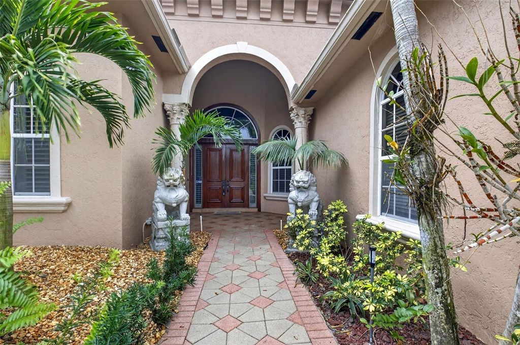 Photo of 16555 White Orchid Ln, Delray Beach, FL 33446 (MLS # O6371917)