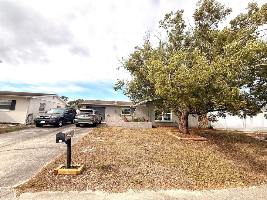 Beautiful 3-bedroom, 2-bathroom home nestled in a desirable HOA-free community. As you arrive, you’ll be welcomed by an oversized driveway and mature landscaping that provide great curb appeal. This home has been lovingly maintained, featuring an 11-year roof, 8-year AC, 7-year water heater, double-pane windows, and hurricane shutters for added comfort, efficiency, and peace of mind.

Step inside to a bright, spacious floor plan filled with natural light. The home features luxury vinyl flooring throughout, with durable tile in the kitchen. The kitchen is equipped with stainless steel appliances, ample counter space, and a large breakfast bar that seamlessly opens to the living area—perfect for preparing your favorite meals and entertaining guests.

From here, head into your beautiful screened-in back porch, complete with custom pavers and plenty of room to relax. It’s the ideal spot to unwind with a good book and enjoy the gorgeous Florida weather year-round. Just beyond the porch is a covered patio area, perfect for grilling, hanging out, and hosting gatherings. This overlooks your fully fenced turf backyard, offering low-maintenance living and plenty of space to store your toys.

Don’t miss your chance to tour this wonderful home today!