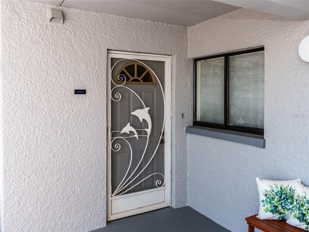 Photo of 4823 Ebbtide Lane #302, Port Richey, FL 34668 (MLS # W7884083)