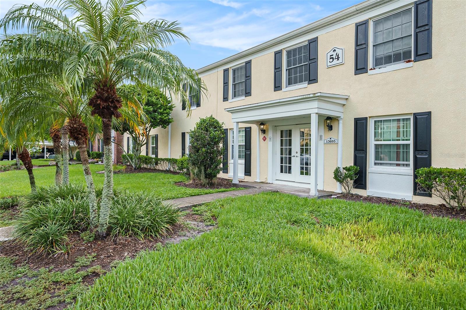 Welcome to your waterfront retreat! This 2-bedroom, 1-bath condo offers more than just a home; it’s a lifestyle in the heart of Tampa. Step inside to a modern kitchen with open concept living and dining areas, plus a private balcony overlooking a tranquil pond with the soothing sound of a fountain. An assigned parking space and plenty of guest parking add everyday convenience. Whispering Oaks, a gated community in the desirable Carrollwood, provides direct access to Lake Magdalene with a private dock, lakeview pool, clubhouse, fitness center, laundry facilities, and car wash station. Best of all, this condo is not in a flood zone and was unaffected by last year’s hurricanes. All exterior maintenance, as well as water, sewer, and trash services, are included in the association monthly fee. Perfectly located near Dale Mabry Hwy and I-275, you’ll enjoy quick access to Tampa International Airport, downtown, shopping, dining, sports venues, entertainment, and Florida’s top beaches. This is more than a condo; it’s your gateway to lakeside living in one of Tampa’s most sought-after neighborhoods. Schedule your private tour today!