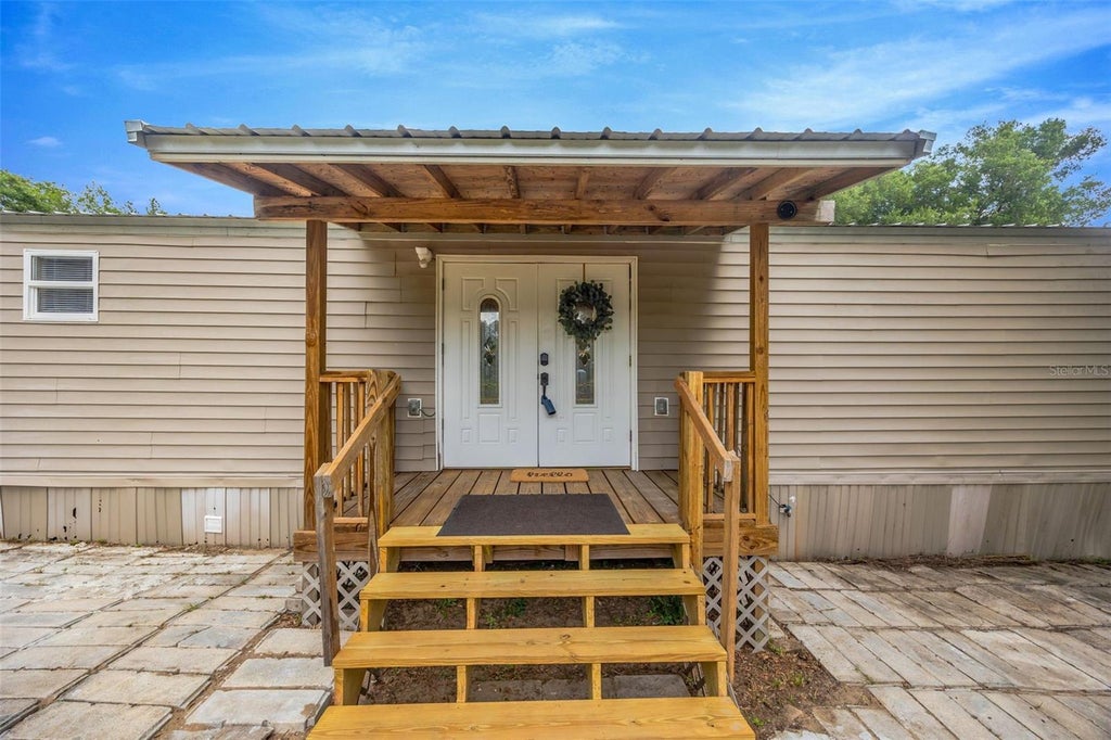 Photo of 19115 Adirondack Terrace, Dade City, FL 33523 (MLS # TB8517815)