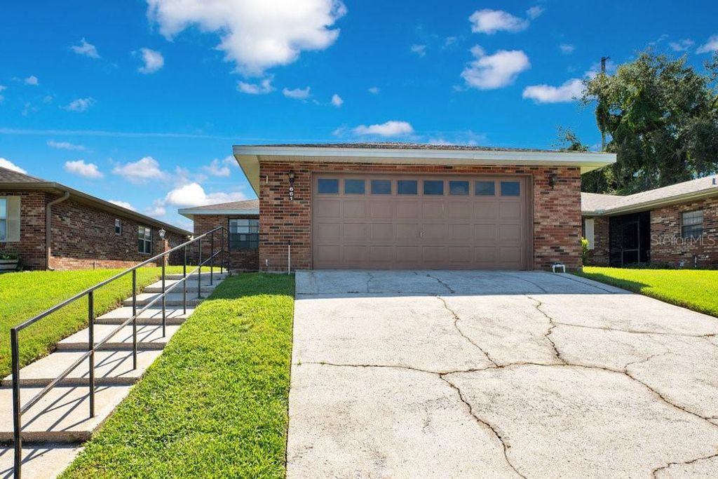 Photo of 661 Lake Carolyn Circle, Lakeland, FL 33813 (MLS # L4955646)