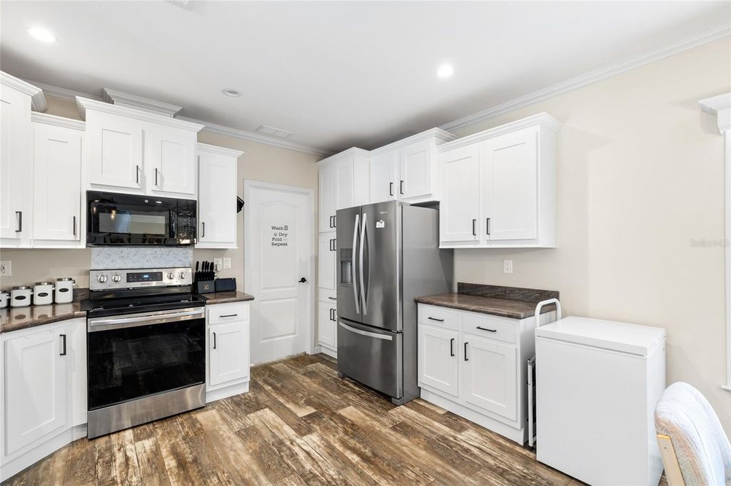 Photo of 6415 Mangrove Drive, Wesley Chapel, FL 33544 (MLS # TB8406497)