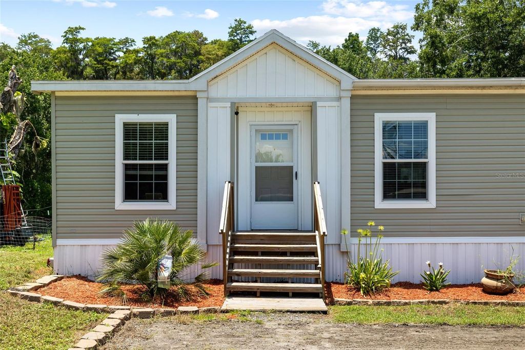 Photo of 6415 Mangrove Drive, Wesley Chapel, FL 33544 (MLS # TB8406497)
