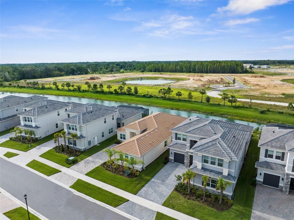Photo of 32309 Rosewood Meadow Lane, Wesley Chapel, FL 33543 (MLS # TB8407110)